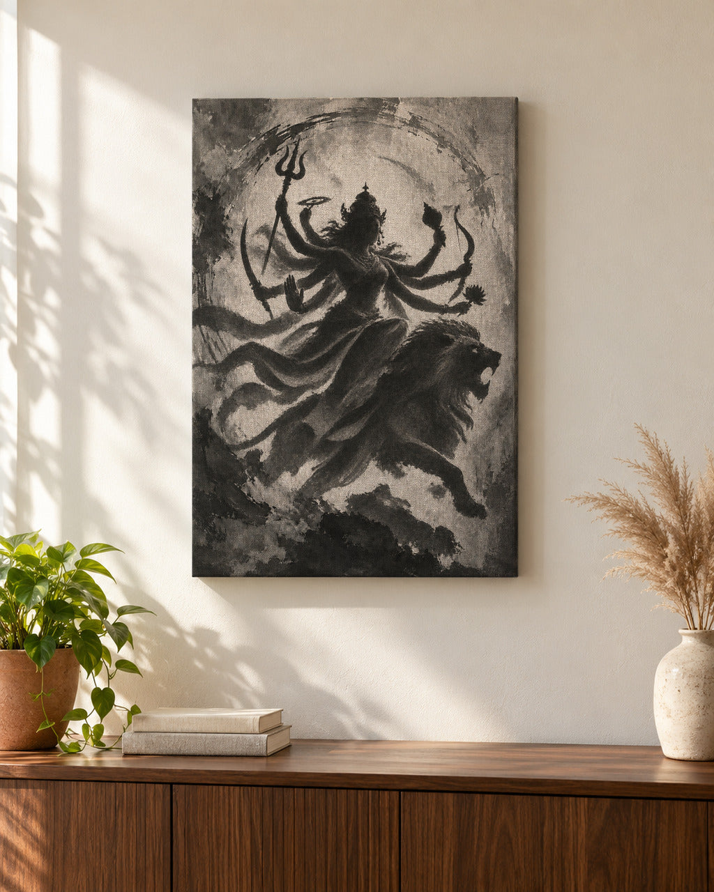Durga on Her Lion canvas above a walnut console in a sunlit living room