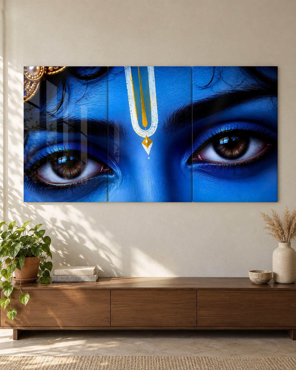 Krishna Gaze set of 3, acrylic, above a walnut console in a sunlit living room