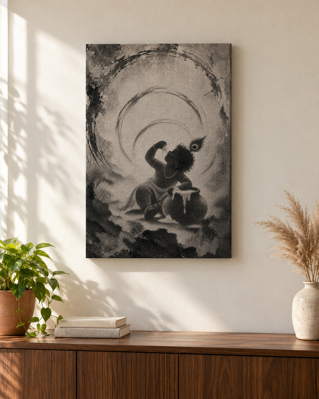 Makhan Chor Krishna canvas above a walnut console in a sunlit living room